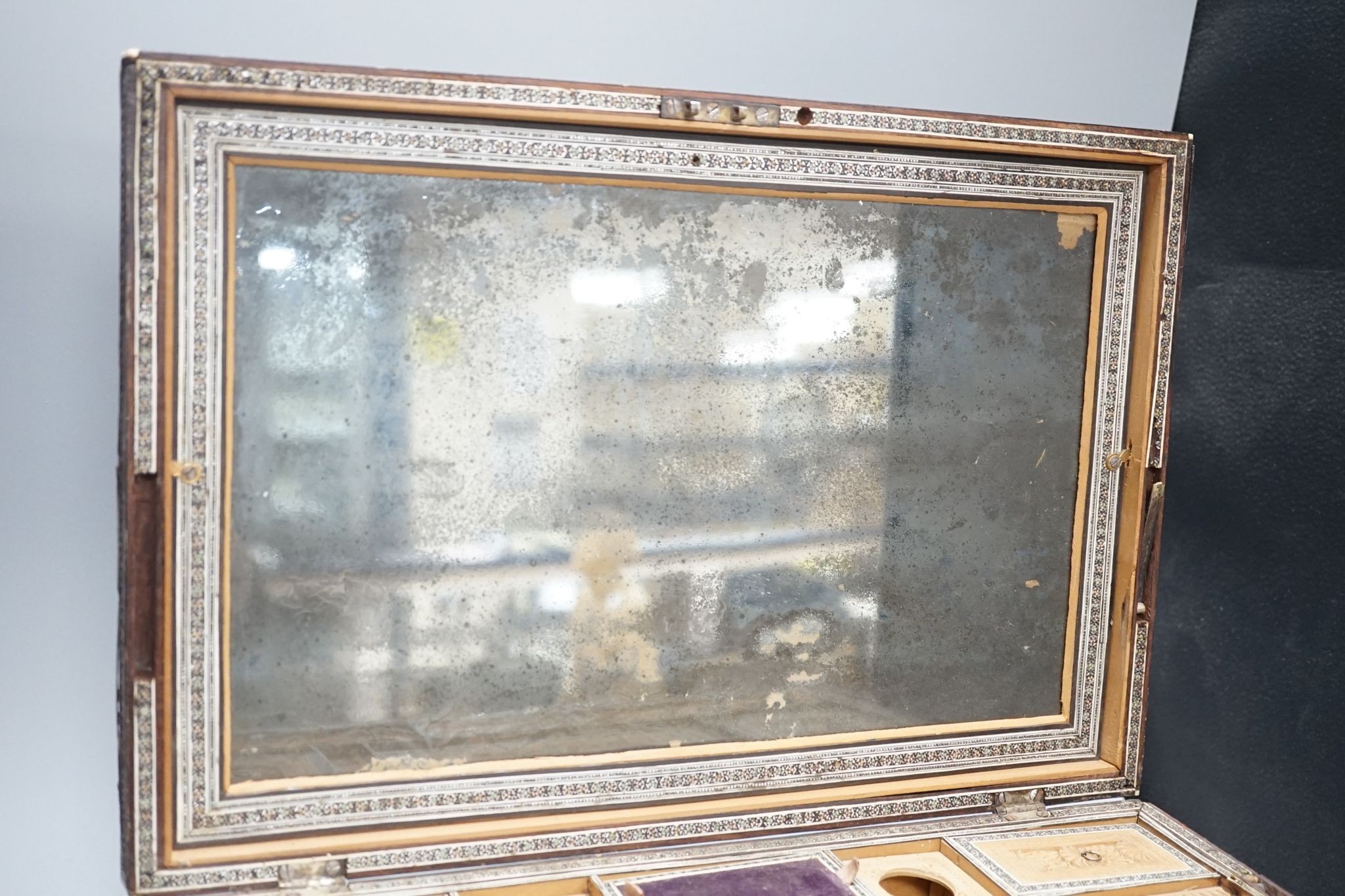 A 19th century South Indian sandalwood sewing box, 44cms wide x 30 deep.